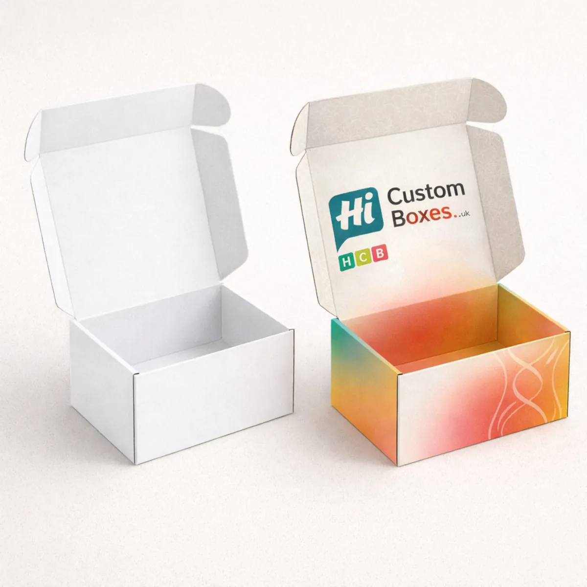 Two open mailing boxes showing a clean white interior and a branded- colourful sunset-themed interior- class=